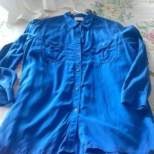 Tunic-length long-sleeve shirt.